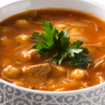 31 - Ramadaninspired harira soup served in a bowl on a rustic wooden tablea classic moroccan dish PNG Image and Clipart